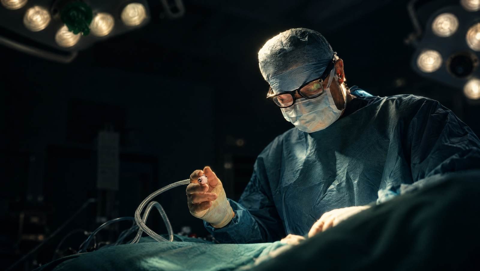 Mr Reza Nassab, Consultant Plastic Surgeon, in theatre