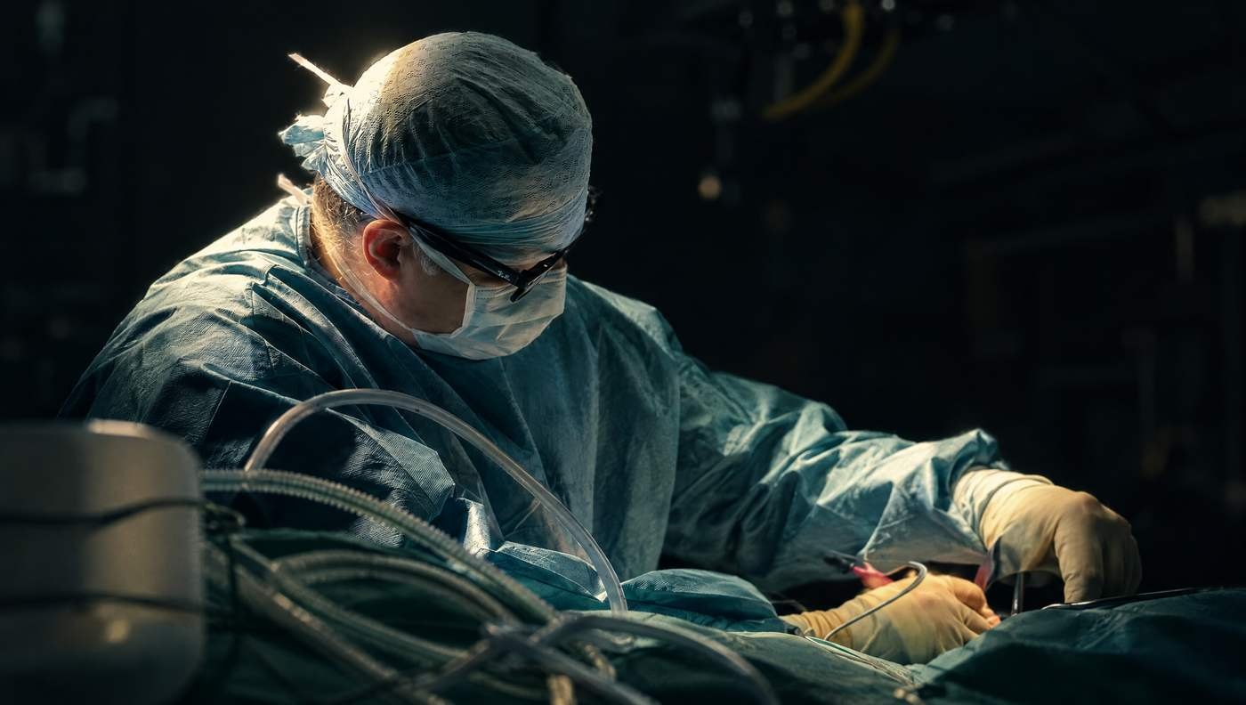 Mr Reza Nassab, Consultant Plastic Surgeon, in theatre